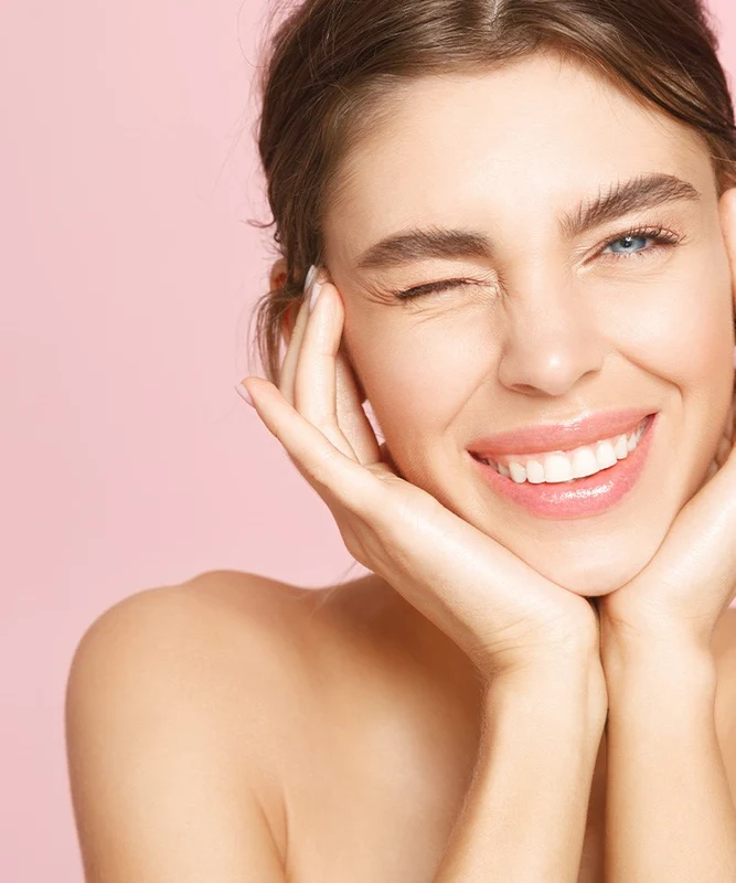 Patient laughing with a bright, healthy smile
