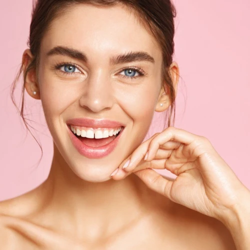 Patient smiling after cosmetic dental care